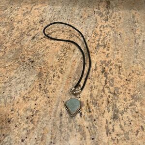 Geometry Drop Crystal necklace. It's a gorgeous Blue green color
